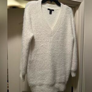 Forever 21 small white sweater fits like a larger medium.
